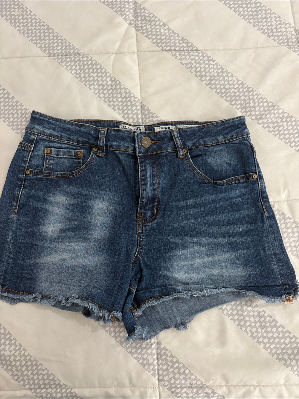 Indigo Rein Distressed Blue Denim Shorts with Frayed Hem